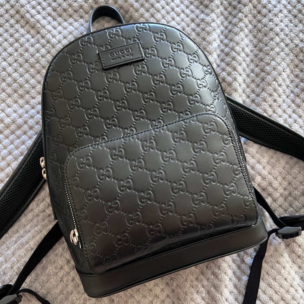 Gucci Black GG Embossed Signature Leather Backpack